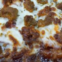 Bbq Porker Pizza · Pepperoni, Bacon , Ham, Sausage and Salami, with BBQ sauce and freshly ground Provolone Cheese