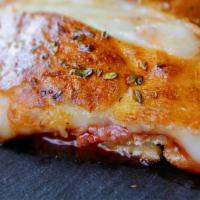 Italian Pretzel Sandwich · The Italian pretzel sandwich features pepperoni, ham, marinara sauce, and provolone cheese e...