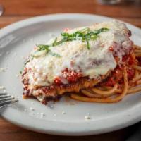 Chicken Parmesan · crispy breaded chicken, red sauce, melted cheese, bucatini pomodoro