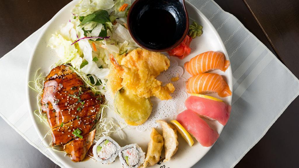 Sushi Combo · Chicken teriyaki, mixed tempura, 4 pieces sushi, 2 pieces California roll and 2 gyoza. Served with daily special salad and miso soup.