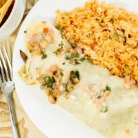 Steak & Cheese Burrito · Strips of tender steak rolled up, topped with pico de gallo, cheese sauce and served with a ...