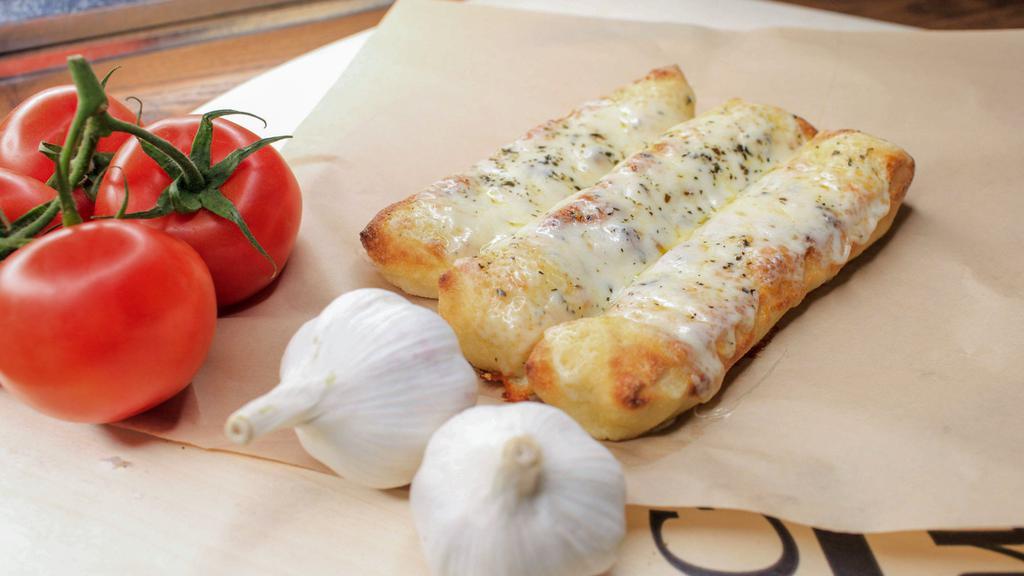 Breadsticks-3 · includes pizza sauce. Add Cheese for an additional charge.