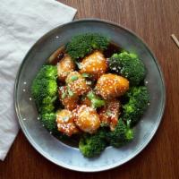 Sesame Chicken · Served with broccoli and sprinkled with sesame seed & green onions.