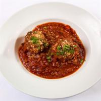 Meatballs Pomodoro · Two delicious large homemade Italian meatballs with chianti braised meat sauce.