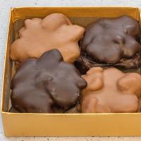 Turtles · Assorted box of 1/2 pound soft chewy caramel and fresh pecans covered in milk and semi sweet...