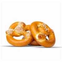 Bavarian Pretzels · Warm, soft pretzels with a crunchy shell served alongside our house cheese dip.