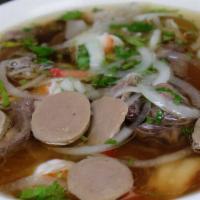 Special Combination Pho' Noodle Soup · Beef meatballs, sliced beef, beef shank and beef stripes. Comes with beansprout, mints, lime...