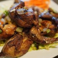 Five Spice Quails · Two pieces. Crispy quails tossed in ginger, scallion, fresh pepper, and five spices.