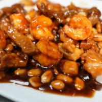 Kung Pao Triple · Spicy. With chicken, beef, shrimp, peanuts, and spicy pepper. Served with white rice.