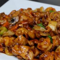 Eight Treasures · Chicken, shrimps, cashew nuts, and vegetables. Served with white rice.