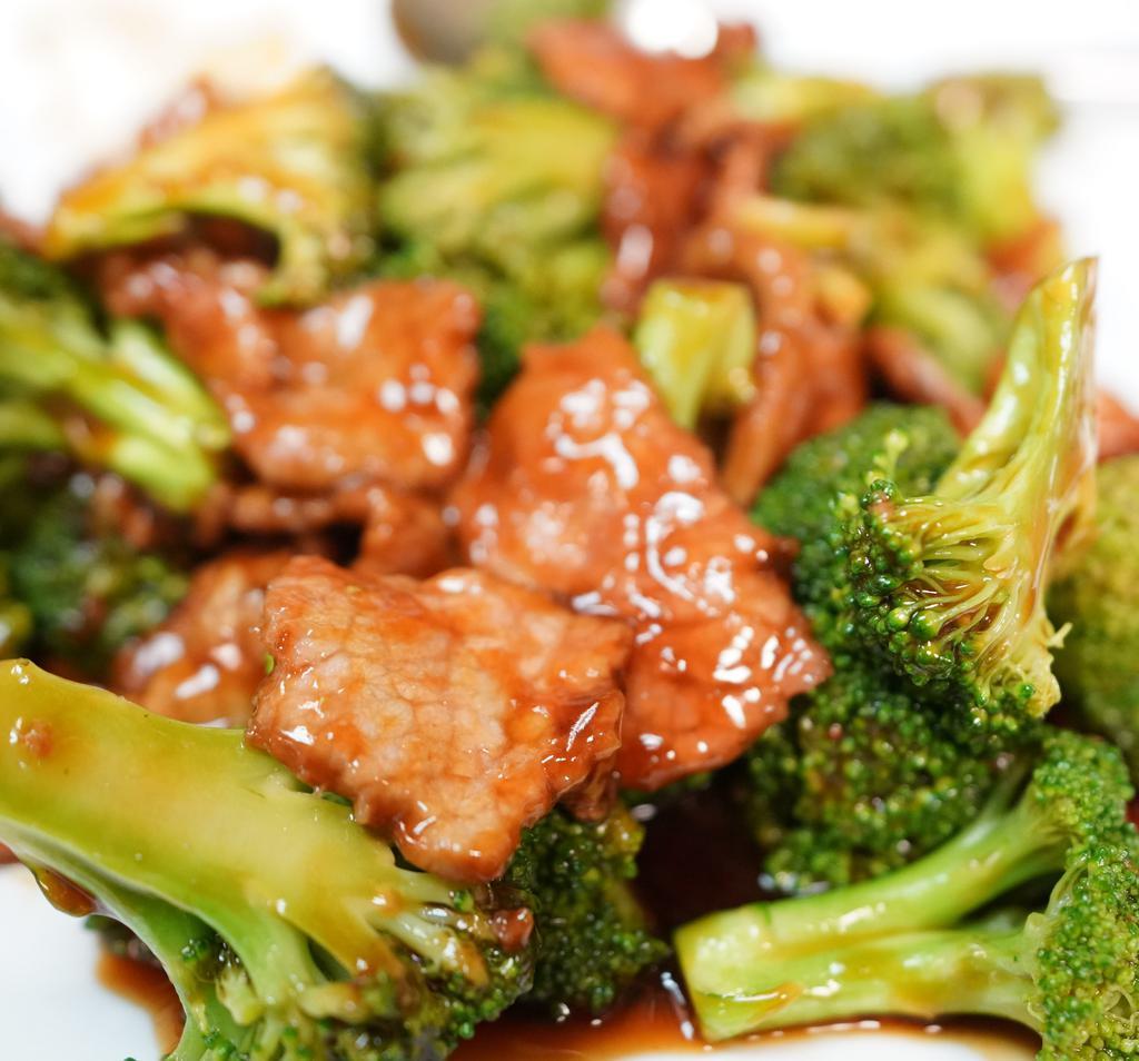 Beef With Broccoli · Beef with broccoli in dark sauce. Served with white rice.