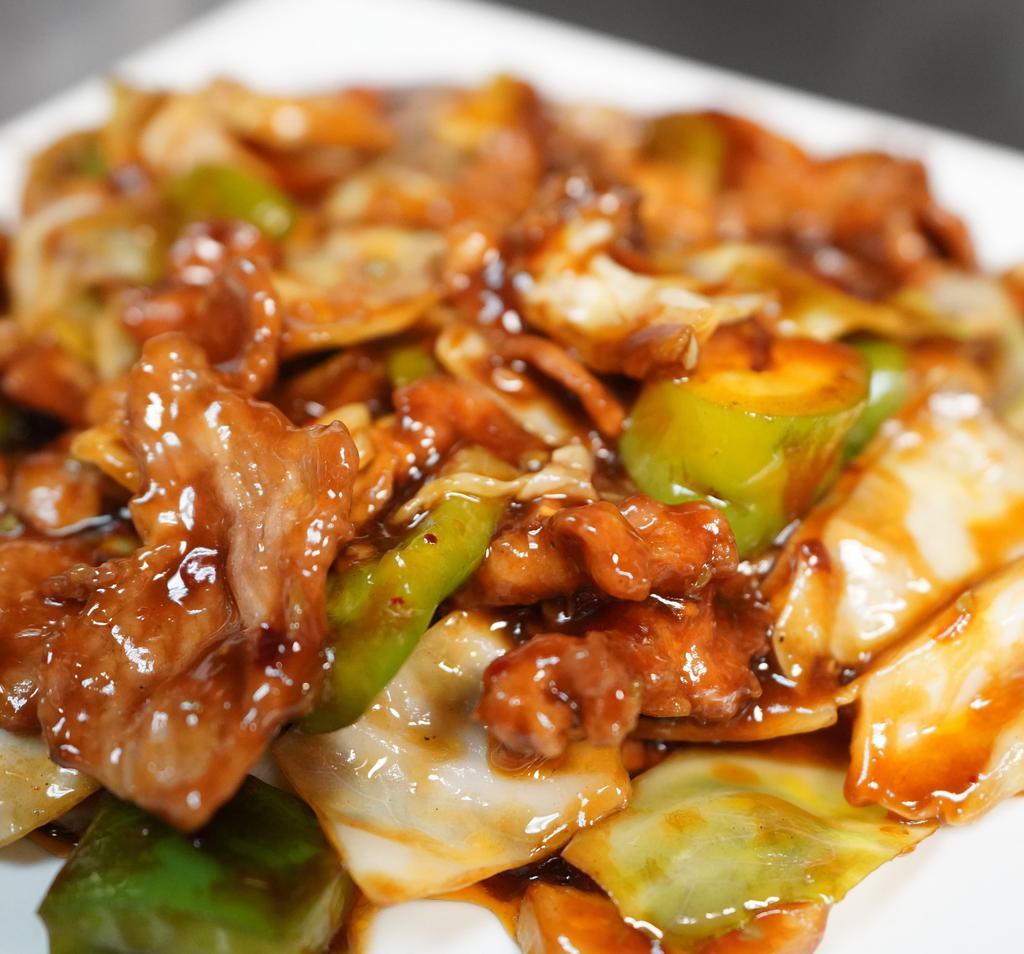 Double Sautéed Pork · Spicy. Pork, cabbage, mushroom, green pepper. Served with white rice.