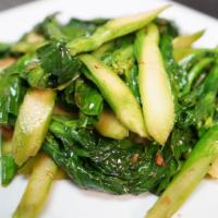 Chinese Broccoli Fresh Garlic · Served with white rice.