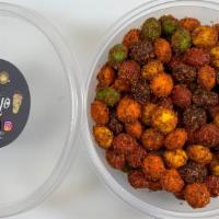Skittles · Skittles coated in chamoy and tajin.
