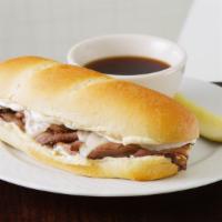 French Dip · Bear's head london broil, provolone, topped with horseradish creme, served on sourdough torp...