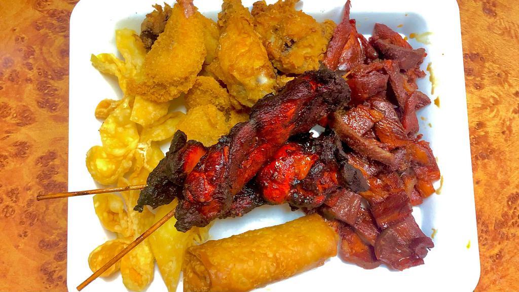 Pu Pu Platter 寶寶盤 · Chicken wings (2), chicken on the stick (2), boneless spare rib, egg roll (1), crab rangoon (4), fried shrimps (5).