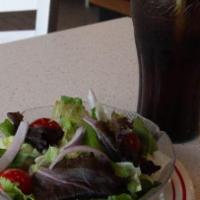 Tossed Salad · Mixed greens with cherry tomatoes, sliced red onions and your choice of dressing