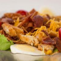 Chicken Bacon Salad · Premium crispy chicken tenders, freshly chopped bacon, shredded cheddar cheese, cherry tomat...