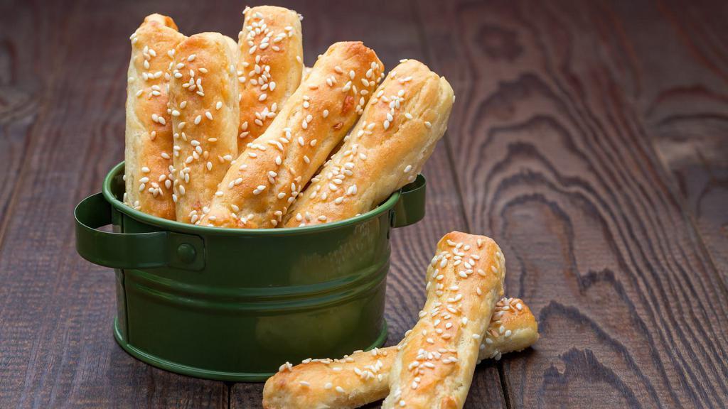 Cheesy Breadsticks · Delicious Breadsticks topped with melted mozzarella cheese.