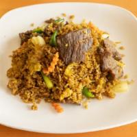 House Fried Rice · Stir Fried with steamed white rice, eggs, white onions, peas, and carrots.