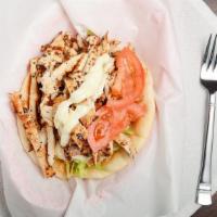 Chicken Pita · One of our favorites...Loaded with delicious seasoned chicken breast, sliced and wrapped in ...