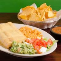Chimichanga · With lettuce, tomato, sour cream and mild sauce with beans. Choice of beef or chicken.