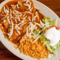 Enchiladas Puebla · Three enchiladas, cheese, chicken and bean, topped with sauce, guacamole and sour cream with...