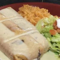 King'S Chimichanga · 12 inch tortilla served with melted cheese, lettuce, tomatoes, sour cream, special sauce and...