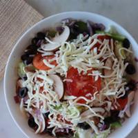 Tossed Green Salad · Lettuce, tomato, mushrooms, black olives, green pepper, onion, mozzarella cheese. Salad dres...
