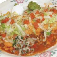 Burrito Fajita · A super burrito. Tender of sirloin or chicken marinated and grilled with fresh green peppers...