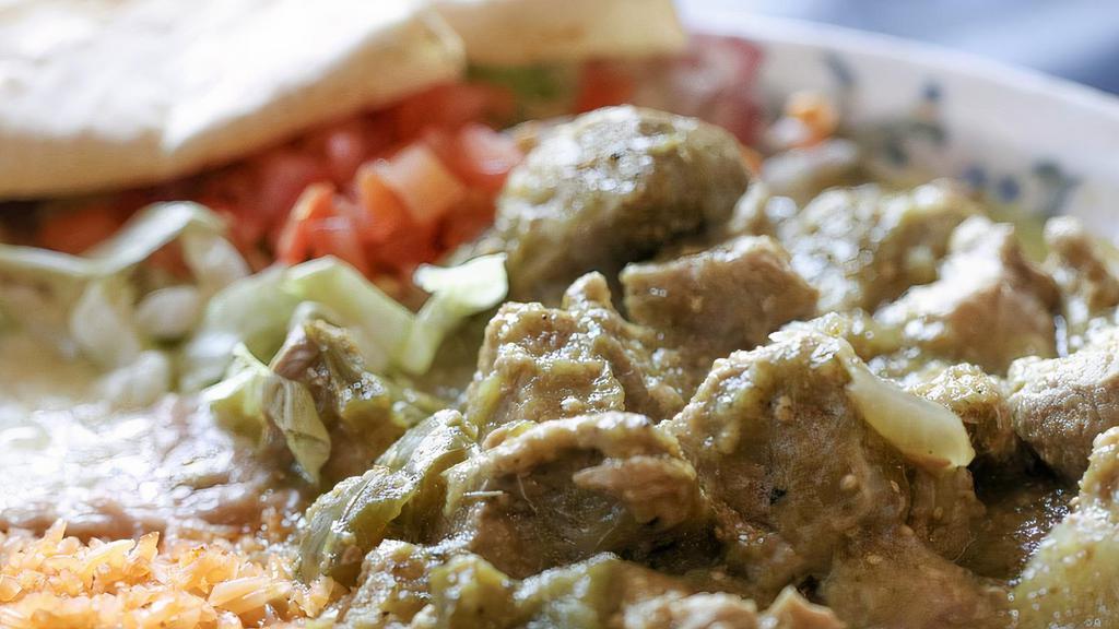Chile Verde · Chunks of pork cooked in a light tomatillo sauce (salsa Verde) with green peppers, onions and spices.