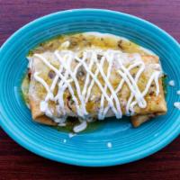 King'S Chimichanga · A large tortilla filled with your choice of ground beef, shredded beef or shredded chicken c...