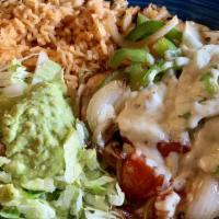 Pollo Ranchero · Delicious chicken breast topped with sautéed bell peppers, onions and tomatoes. Covered with...
