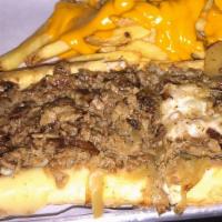 Authentic Philly Cheesesteak · Grilled onions, choice of white American, smoked provolone or aged cheddar sauce. Prepared w...