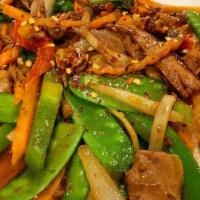 Thai Basil  · Bell peppers, carrots, onions, pea pods, mushroom, and
thai basil wok tossed in a savory lig...
