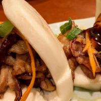 Bao Bao Buns (4) · In-house caramelized duck served in a steam bao buns.