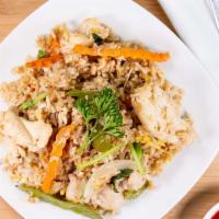 Basil Fried Rice · Broccoli, onions, and basil. Topped with cilantro and scallions.