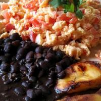 Breakfast · Scramble eggs with tomatoes and onion, Black beans, Fried Platins, Cheese