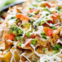 Nachos  · No game day or family Dinner night is quite complete without a super-sized snack like our fa...