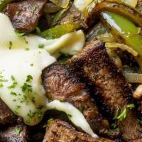 Philly Cheese Steak · Served with steak, chopped onions, diced green peppers, mushroom & mozzarella cheese. Comes ...