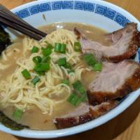 Miso Ramen · Ramen noodles topped with chashu pork, cabbage, bean sprouts, green onion, and sesame seed i...
