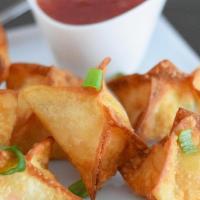 5 Piece Golden Crab Rangoon · A mixture with imitation crab meat, cream cheese and celery wrapped in wonton skin and deep ...