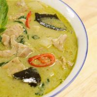 Green Curry · Spicy. Green curry paste cook with coconut milk and bamboo shoot with your choice of meat to...