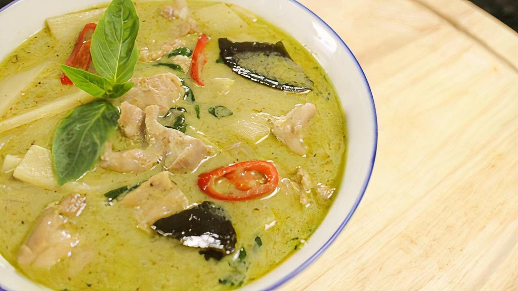 Green Curry · Spicy. Green curry paste cook with coconut milk and bamboo shoot with your choice of meat topped with basil leaves. Served with small steamed jasmine rice.