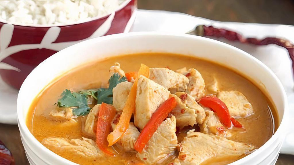 Red Curry · Spicy. Red curry paste cook with coconut milk and bamboo shoot with your choice of meat topped with basil leaves. Served with small jasmine rice.