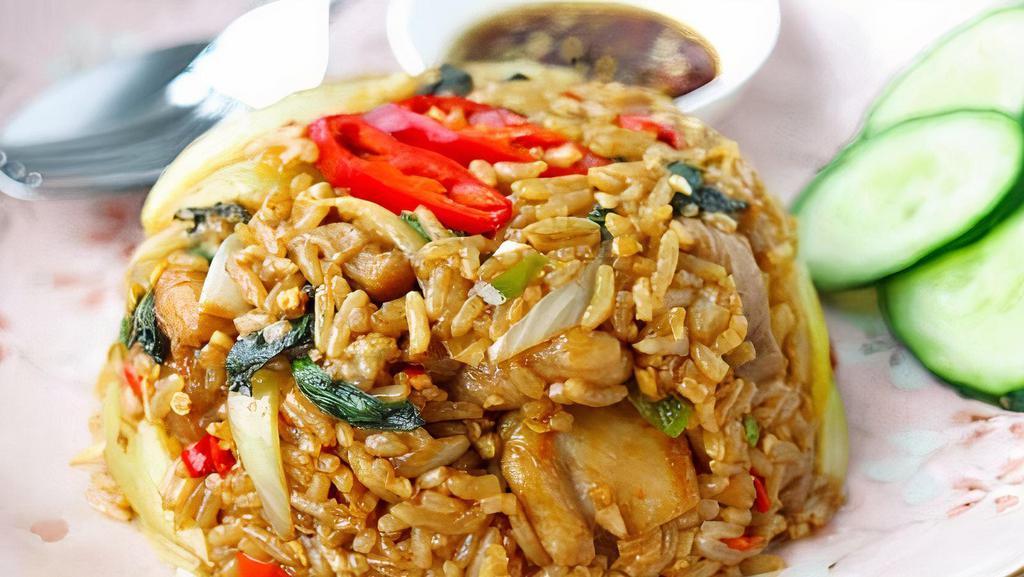Siam Basil Fried Rice · Spicy. Spicy basil fried rice with onion, basil, bell pepper, jalapeno and garlic Thai chili and your choice of meat topped with green onion.