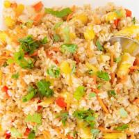 Pineapple Fried Rice · Stir fried rice with egg, onion, carrot, and pineapple with your choice of meat topped with ...