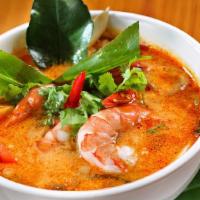 23, Tom Yum Soup · Spicy. Thai-style soup with mushroom, lemongrass, lime juice, chili, and cilantro, your choi...