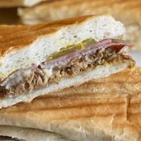 Cuban Sandwich · Roasted pork, ham, pickles, mustard, mayo, cheese.