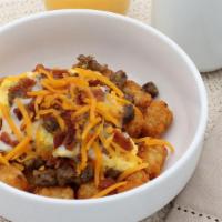 Sausage Breakfast Bowl · Scrambled eggs with sausage, gravy, cheddar cheese, and bacon bits served over your choice o...